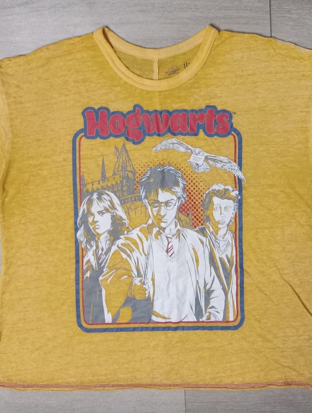 Harry Potter Yellow Hogwarts Graphic Tee with Red & Blue Details